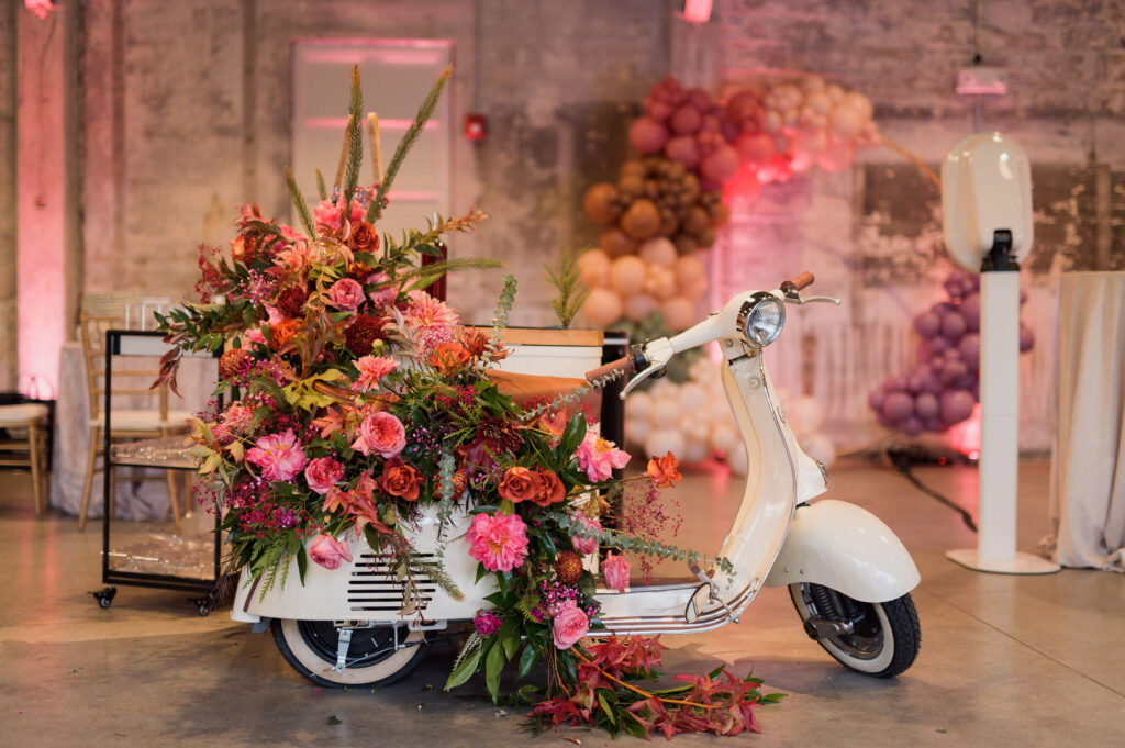 a dramatic floral arrangement makes this vintage scooter even more interesting