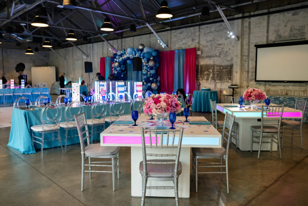 a family celebration includes lighted tables and lots of color