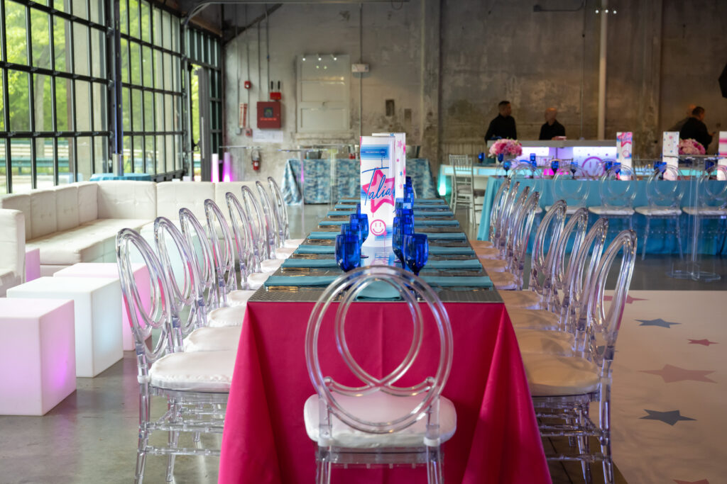 A long banquet table for a family celebration at garage b