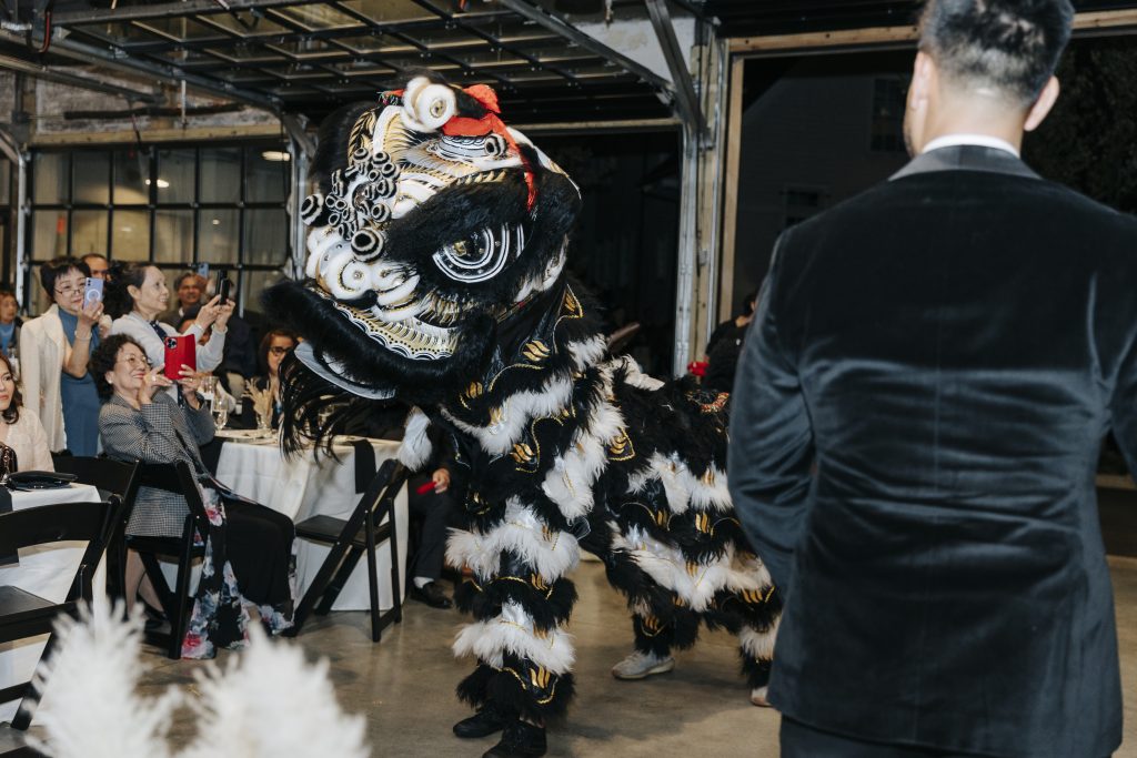 A dragon dance performance at a Chinese wedding.