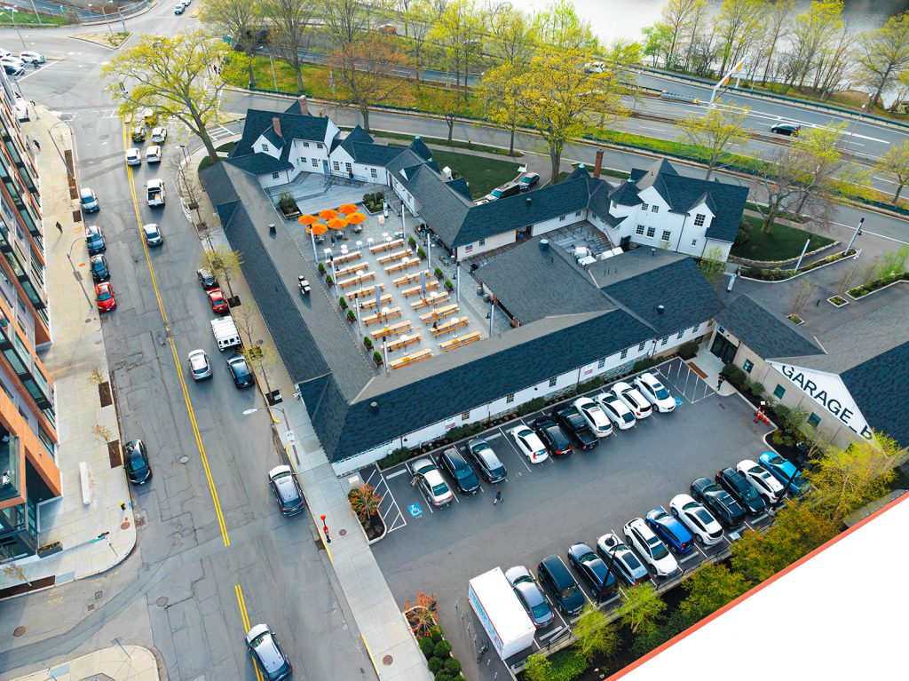 An aerial view of the Charles River Speedway and Garage B, situated at the junction of Western Avenue and Soldiers Field Road in Allston-Brighton, a neighborhood of Boston.