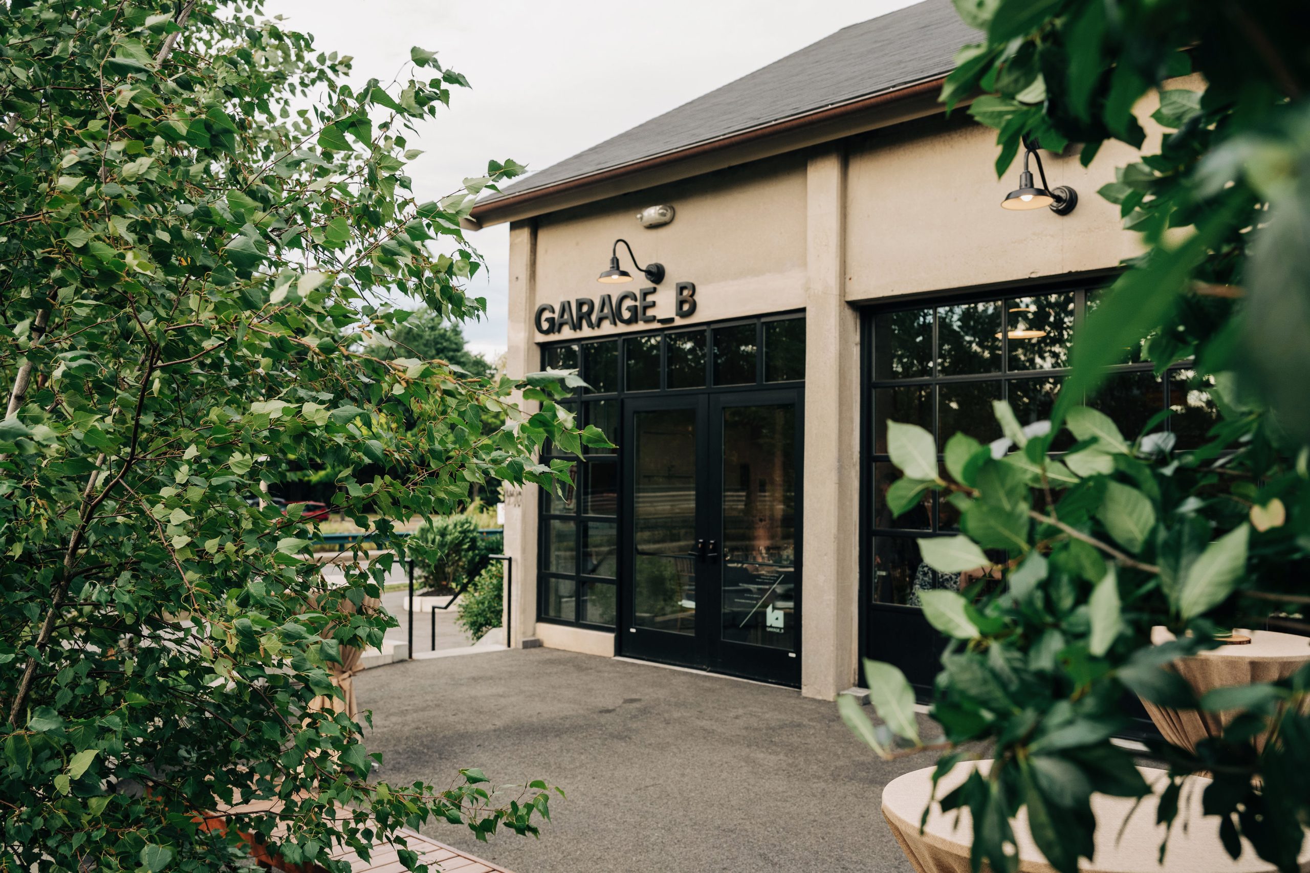 A portion of Garage B's exterior and it's adjacent patio.