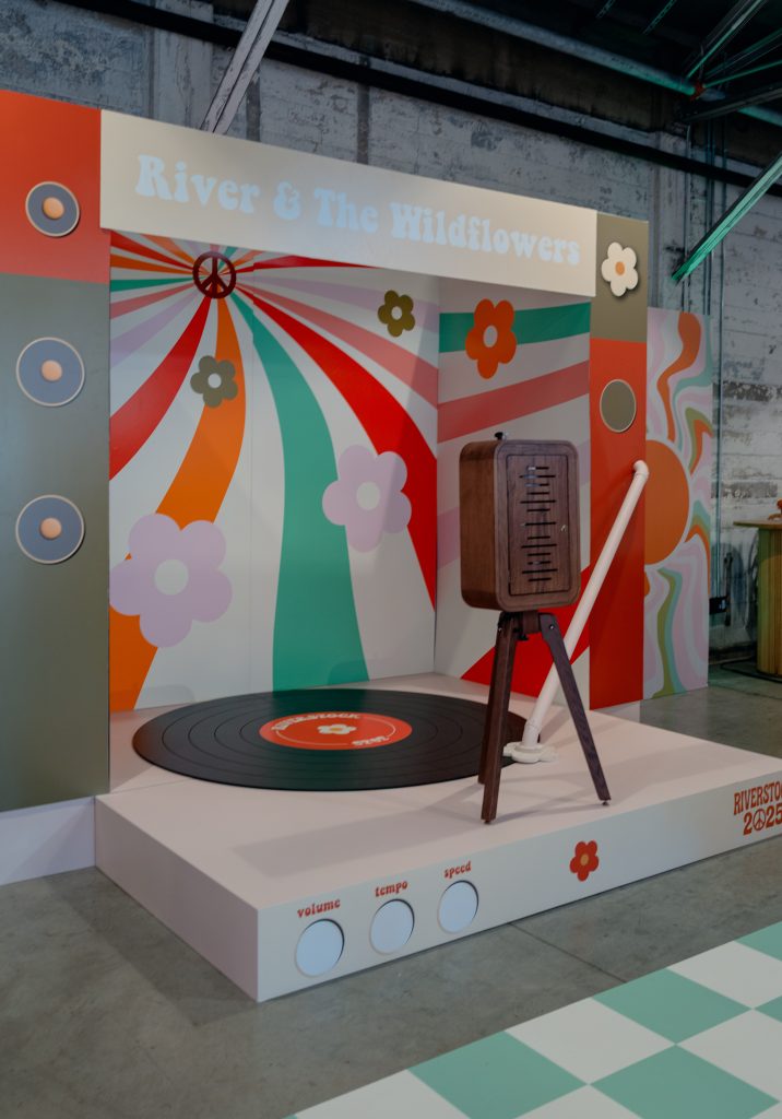 A cutstom-built photo booth styled after a giant vinyl turntable